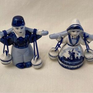 Blue and White Man And Woman Ceramic Figurines